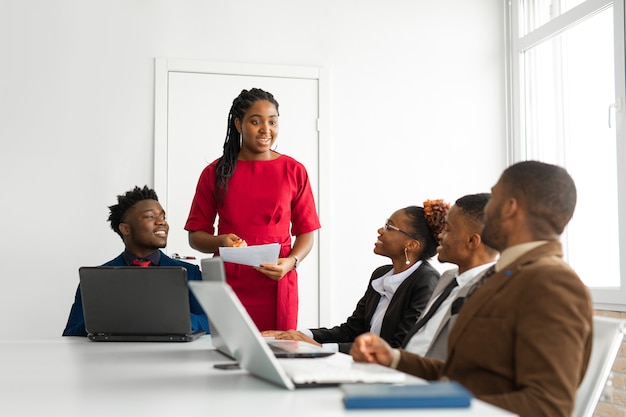 team-young-african-people-office-table-with-laptop_219728-4557